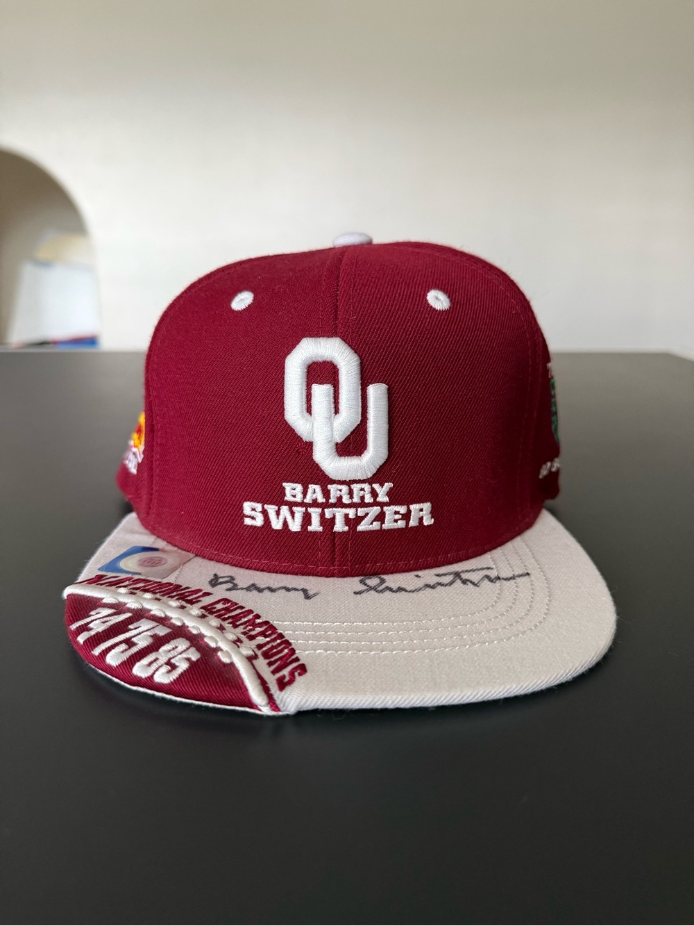 Autographed Top of the World Crimson and White OU Barry Switzer Snapback Hat